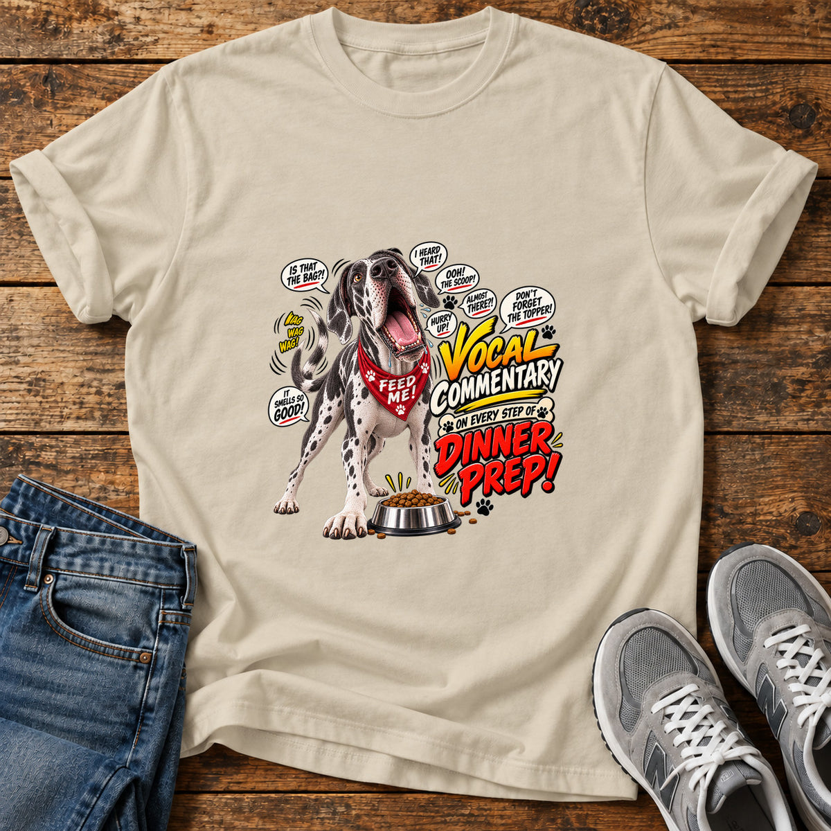 Dinner Prep Commentary Great Dane graphic T-shirt in Sand, shown on a flat-lay shirt mockup