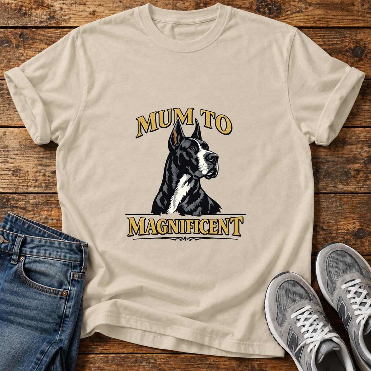 Mum To Magnificent Great Dane graphic T-shirt in Sand, shown on a flat-lay shirt mockup