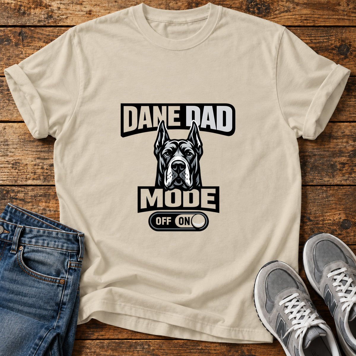Dane Dad Mode Great Dane graphic T-shirt in Sand, shown on a flat-lay shirt mockup