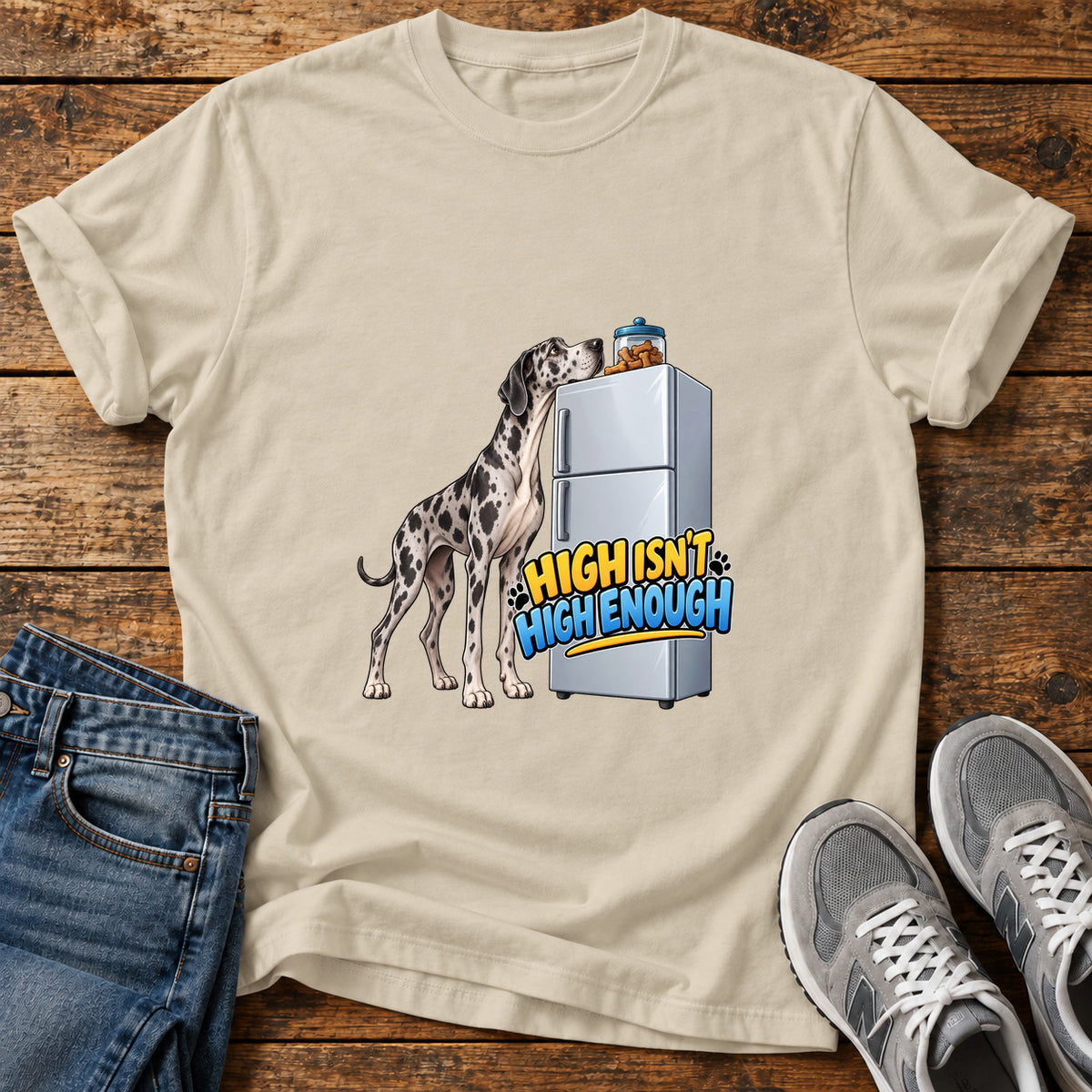 High Isn't Enough Great Dane graphic T-shirt in Sand, shown on a flat-lay shirt mockup