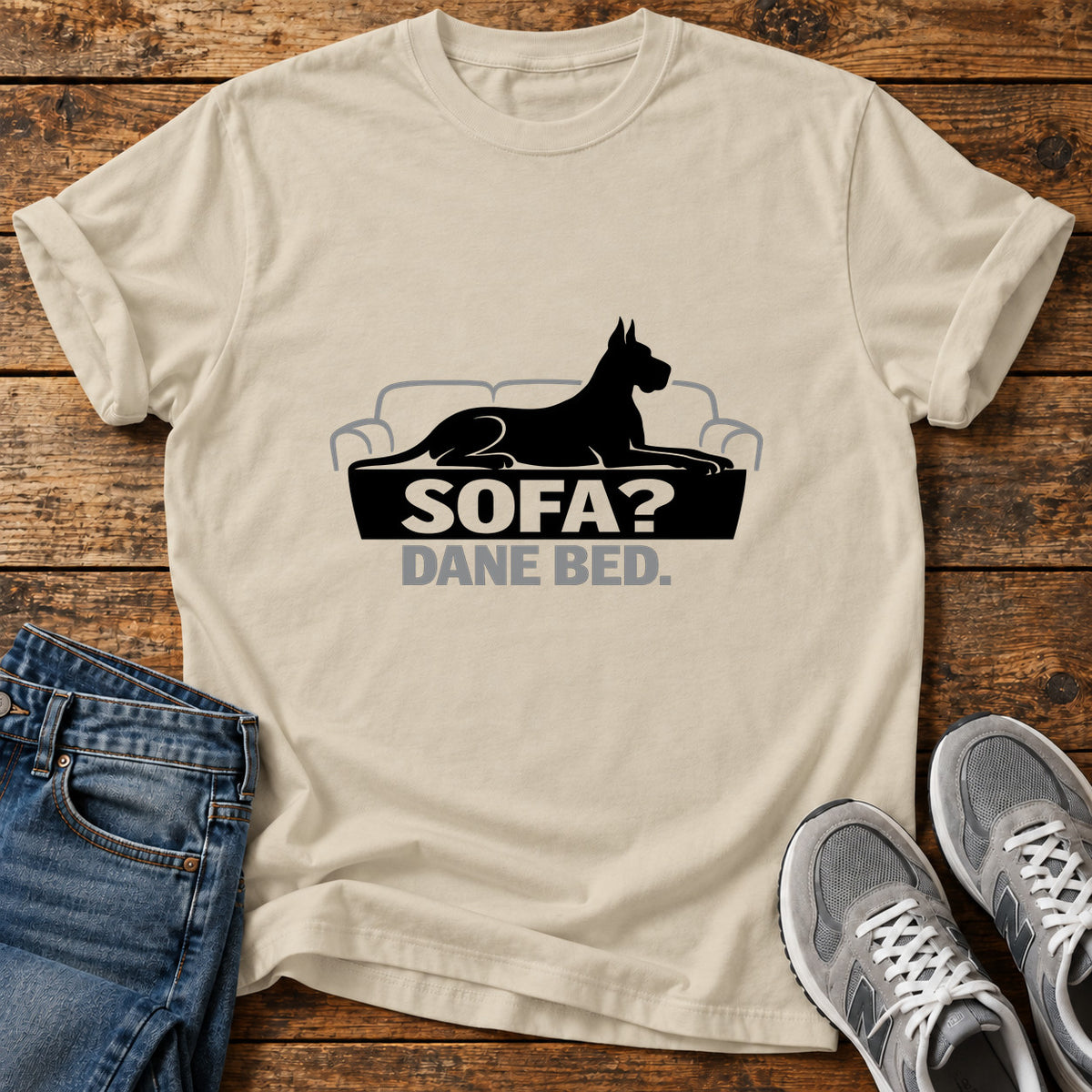 Sofa Dane Bed Great Dane graphic T-shirt in Sand, shown on a flat-lay shirt mockup