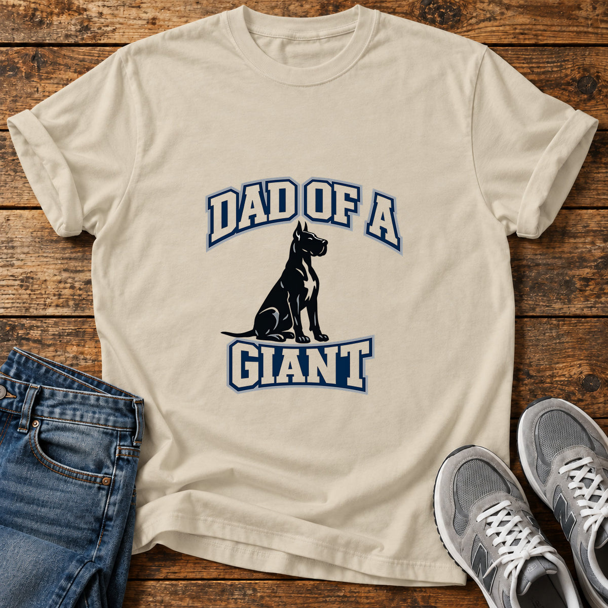 Dad Of Giant Great Dane graphic T-shirt in Sand, shown on a flat-lay shirt mockup