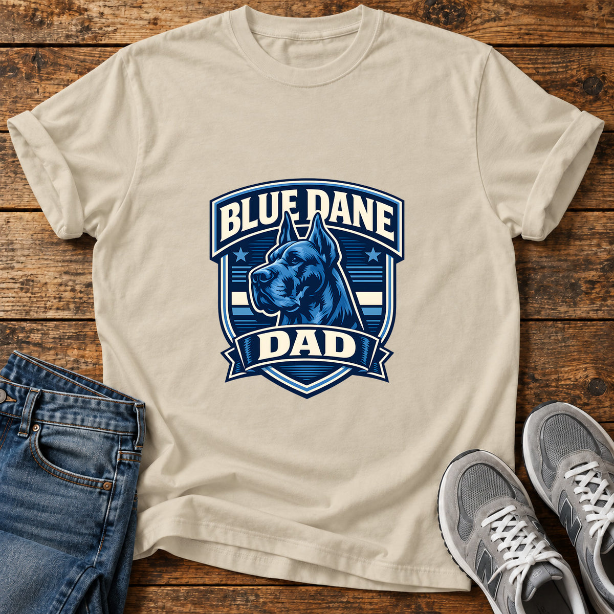 Blue Dane Dad Great Dane graphic T-shirt in Sand, shown on a flat-lay shirt mockup
