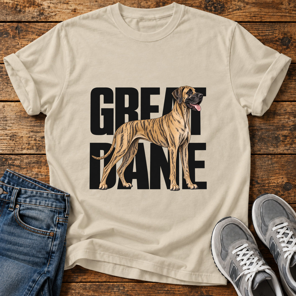 Great Dane graphic T-shirt in Sand, shown on a flat-lay shirt mockup