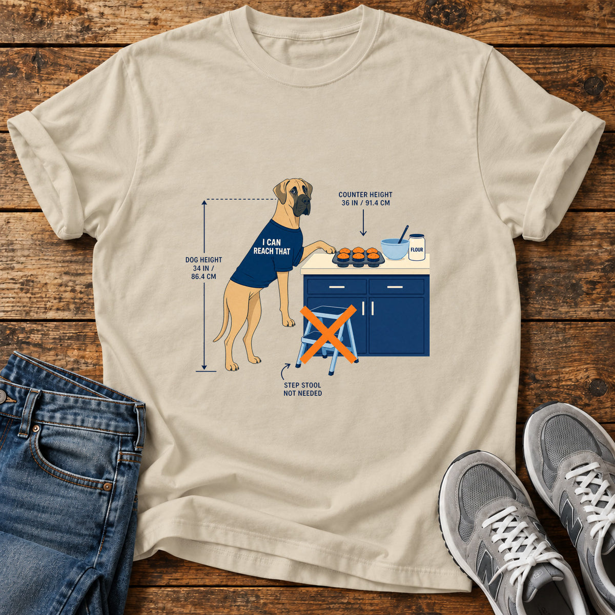 I Can Reach Great Dane graphic T-shirt in Sand, shown on a flat-lay shirt mockup