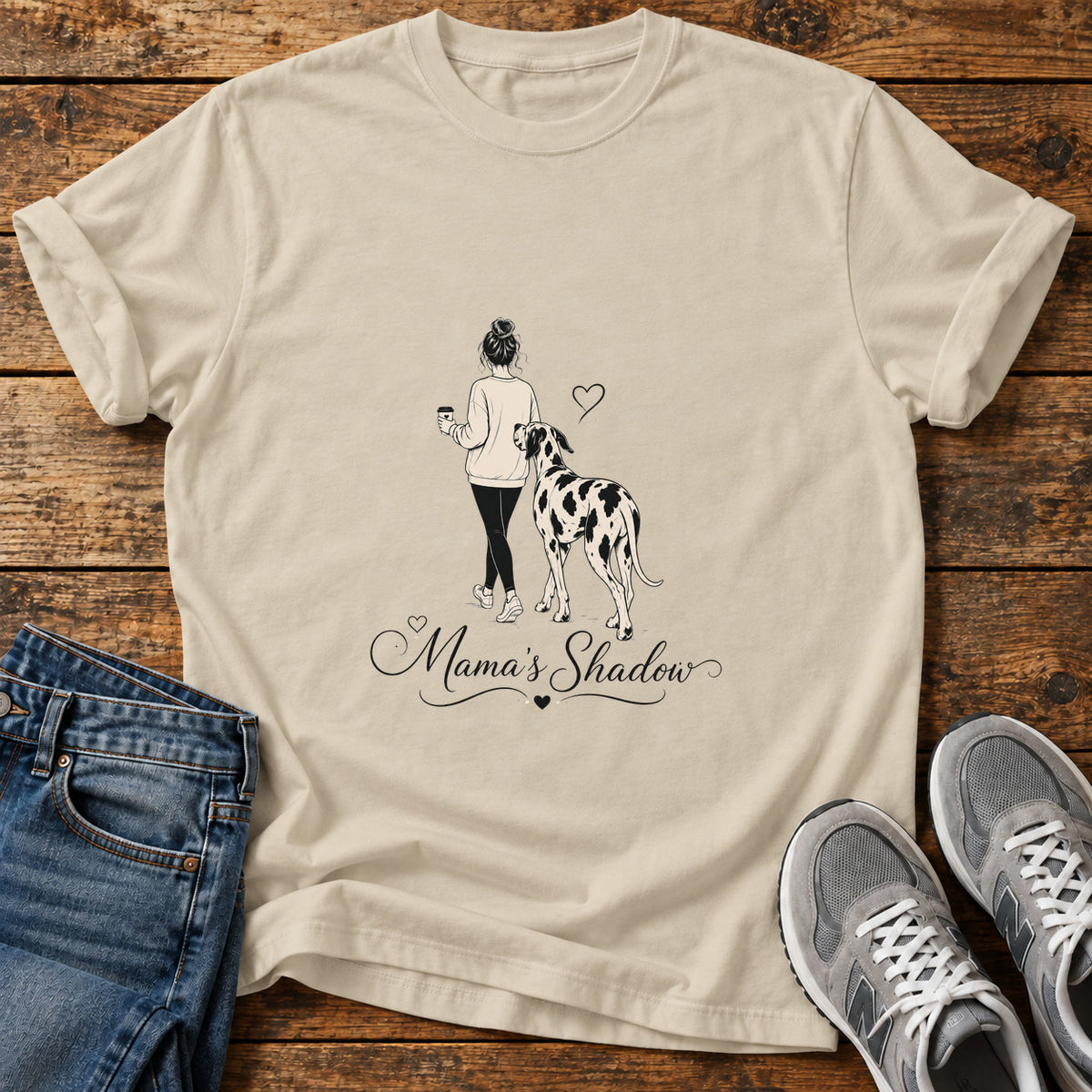 Mama's Shadow Great Dane graphic T-shirt in Sand, shown on a flat-lay shirt mockup