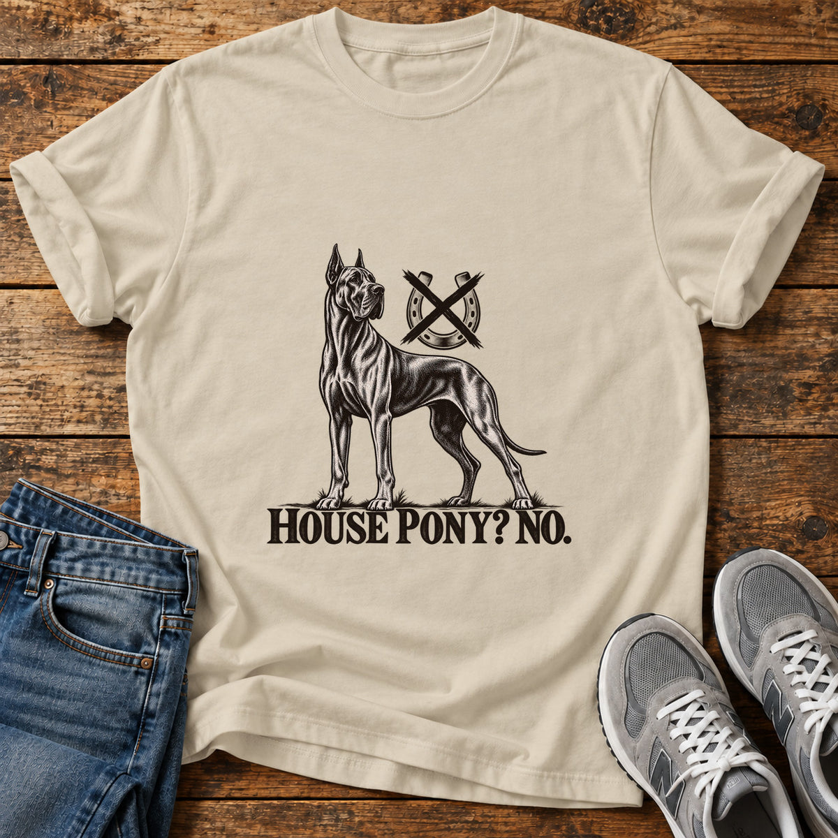 House Pony No Great Dane graphic T-shirt in Sand, shown on a flat-lay shirt mockup