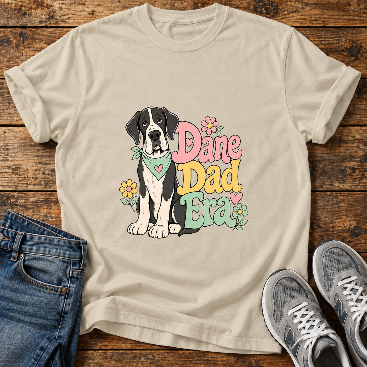 Dane Dad Era Great Dane graphic T-shirt in Sand, shown on a flat-lay shirt mockup