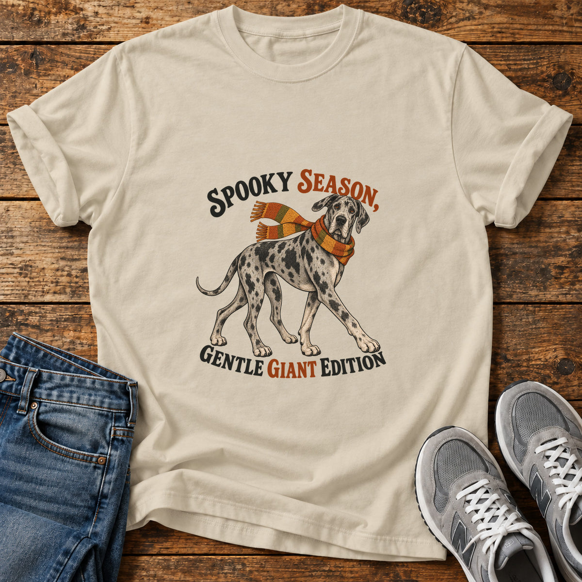 Spooky Giant Edition Great Dane graphic T-shirt in Sand, shown on a flat-lay shirt mockup