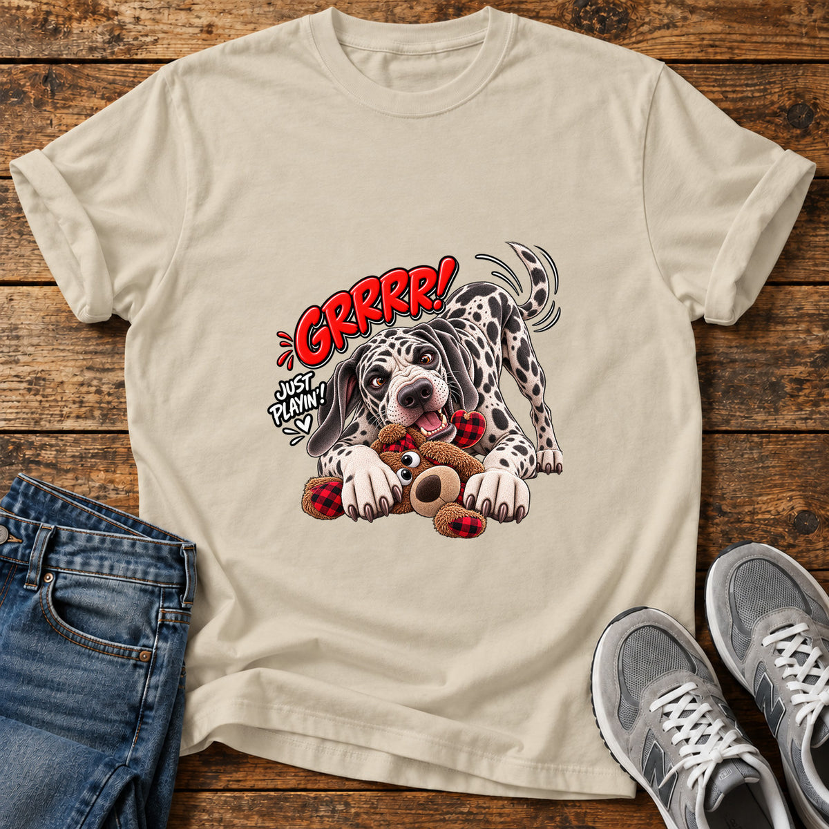 Grrr Just Playin Great Dane graphic T-shirt in Sand, shown on a flat-lay shirt mockup