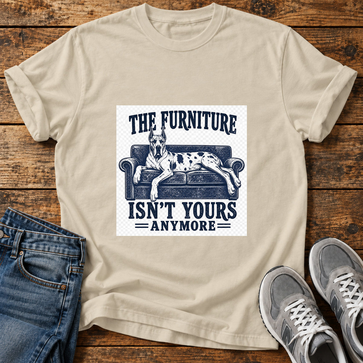 Furniture Takeover Great Dane graphic T-shirt in Sand, shown on a flat-lay shirt mockup