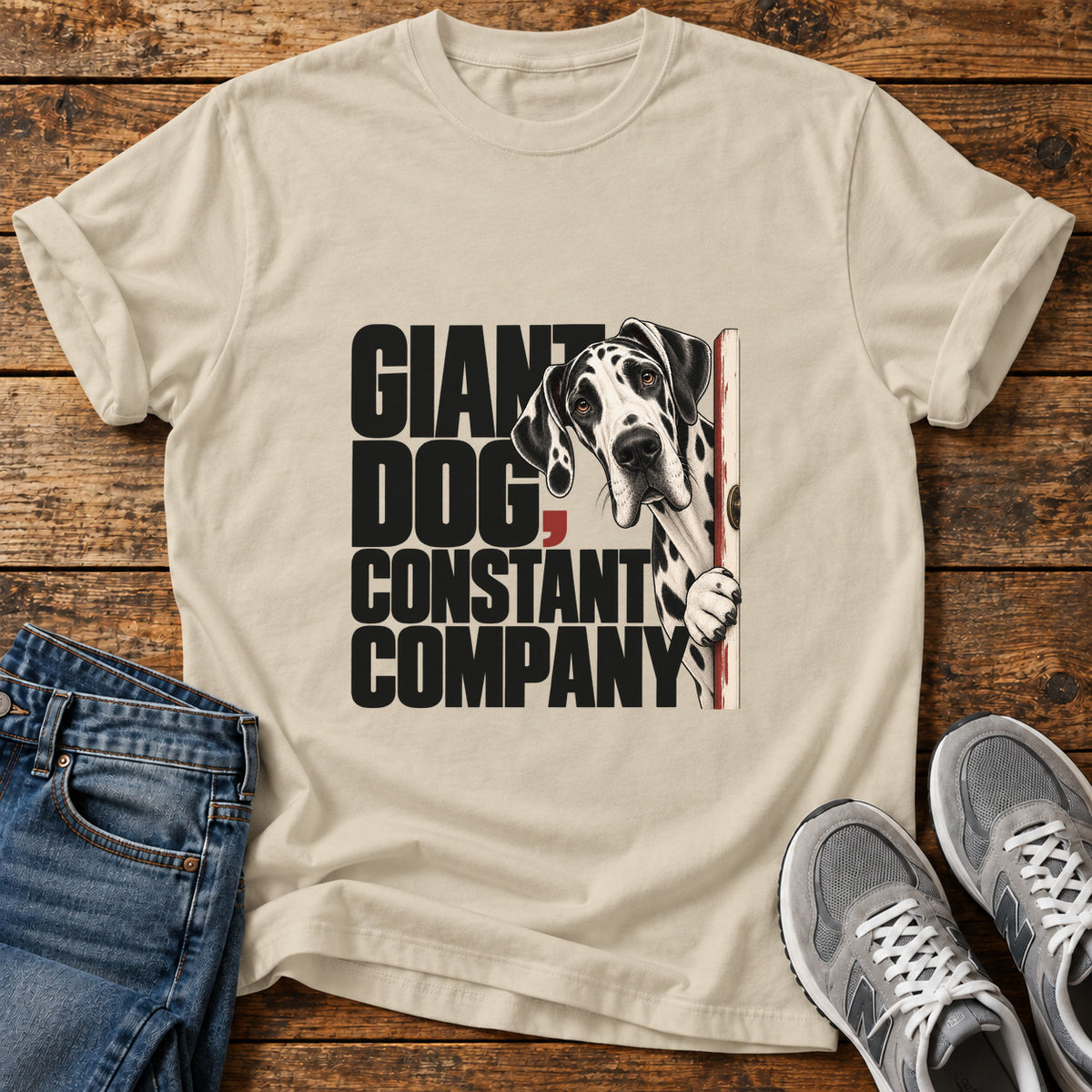 Giant Dog Company Great Dane graphic T-shirt in Sand, shown on a flat-lay shirt mockup