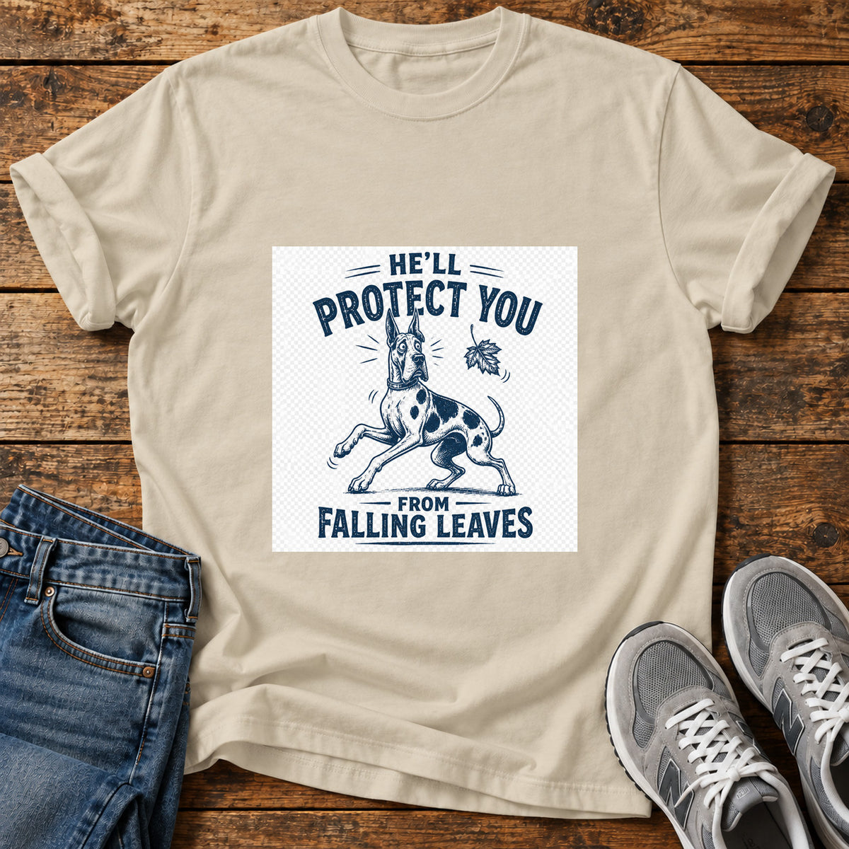 Protective Pooch Great Dane graphic T-shirt in Sand, shown on a flat-lay shirt mockup