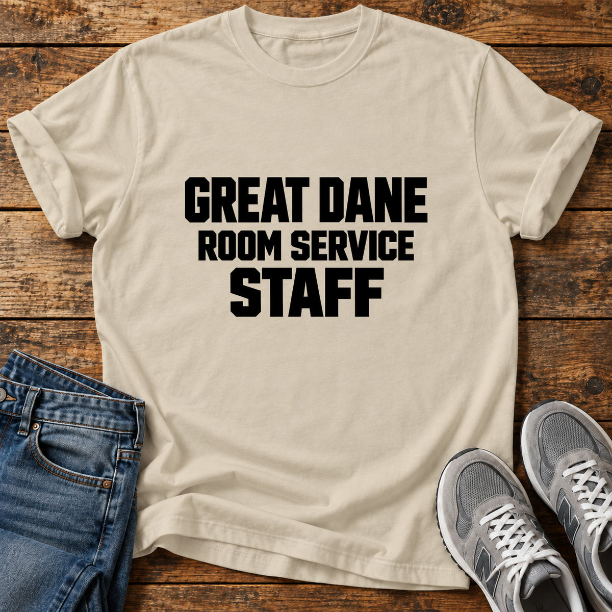 Great Dane Service graphic T-shirt in Sand, shown on a flat-lay shirt mockup