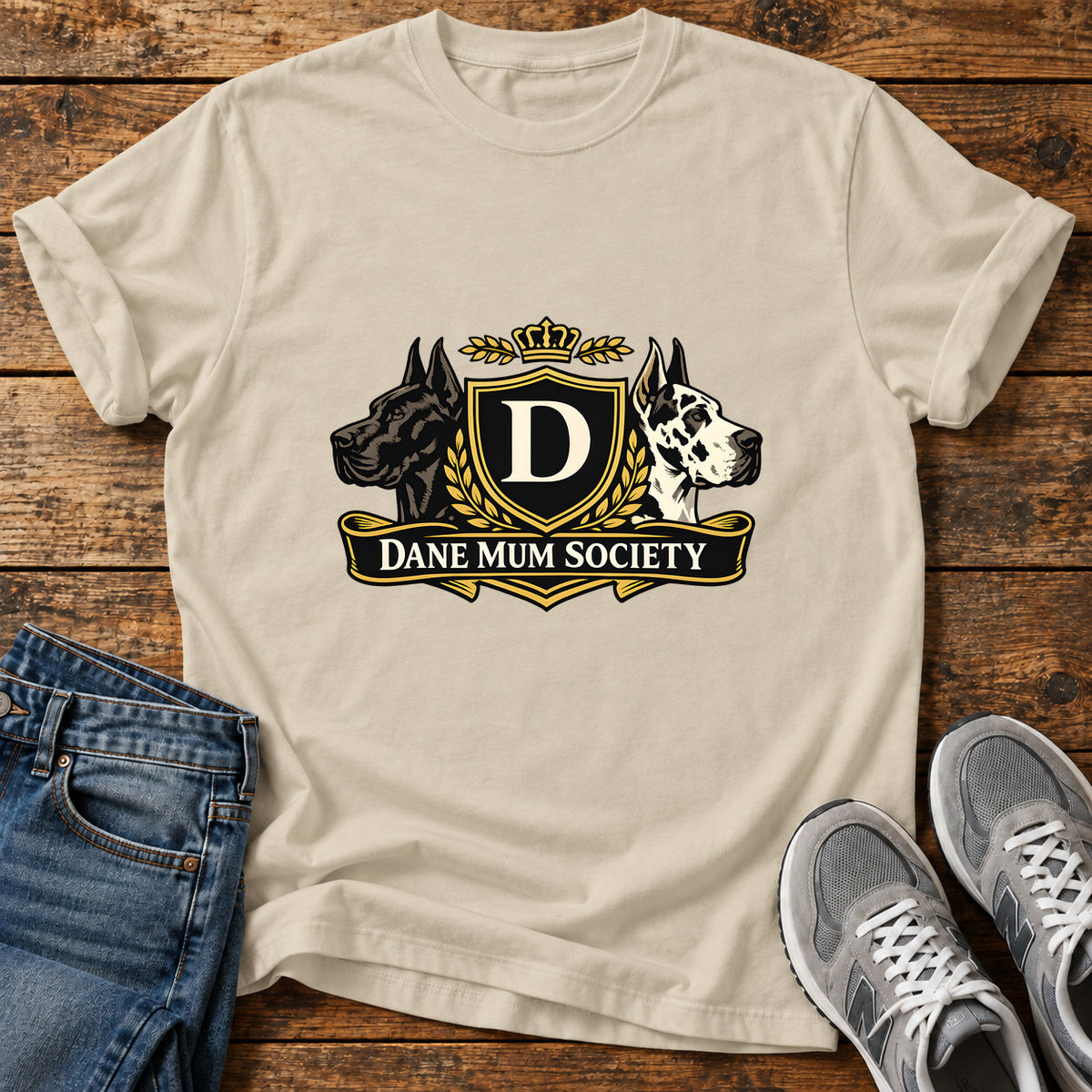 Dane Mum Society Great Dane graphic T-shirt in Sand, shown on a flat-lay shirt mockup