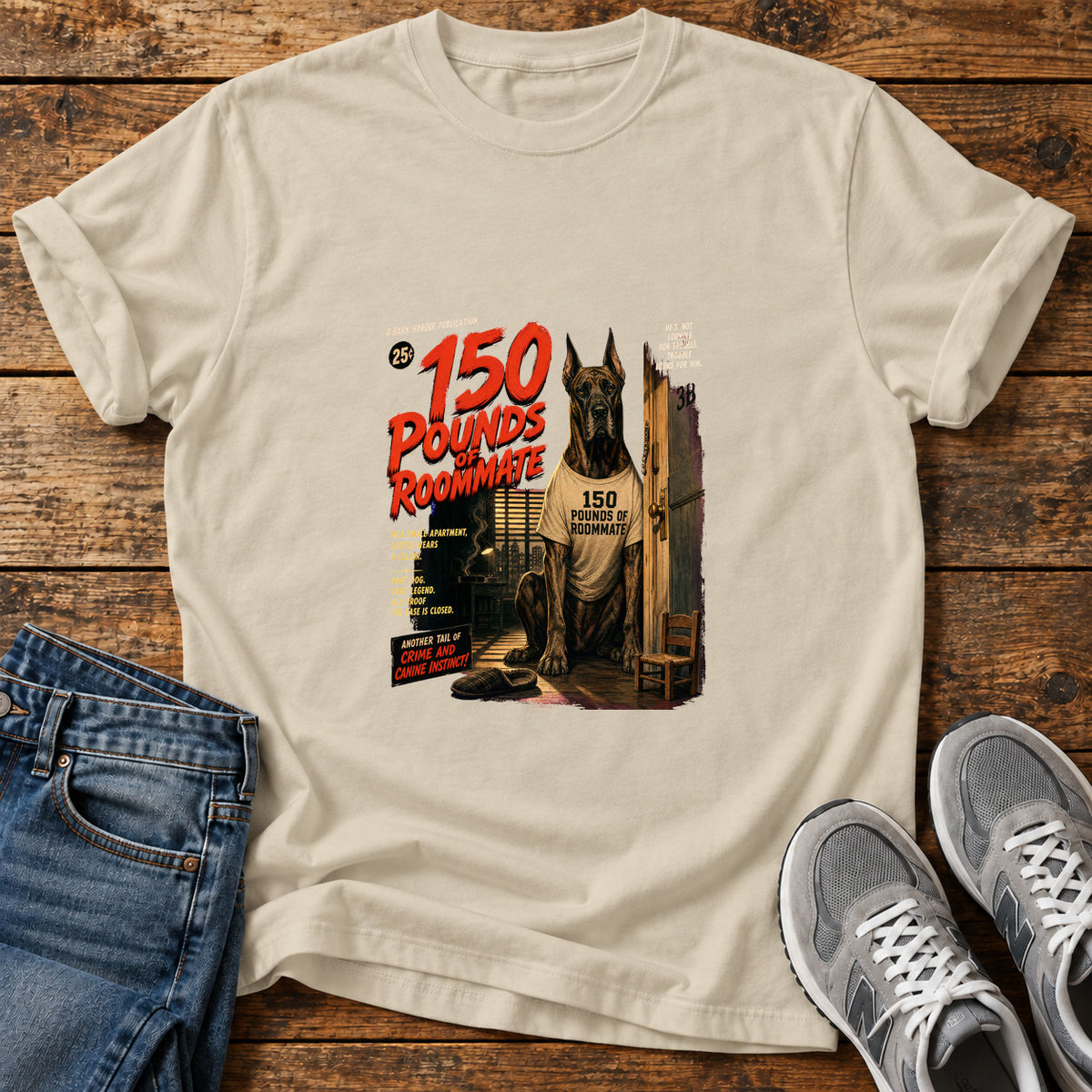 150 Pounds Roommate Great Dane graphic T-shirt in Sand, shown on a flat-lay shirt mockup