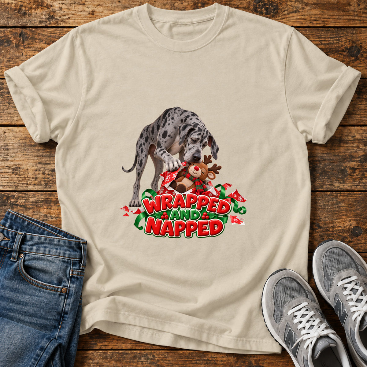Wrapped Napped Great Dane graphic T-shirt in Sand, shown on a flat-lay shirt mockup