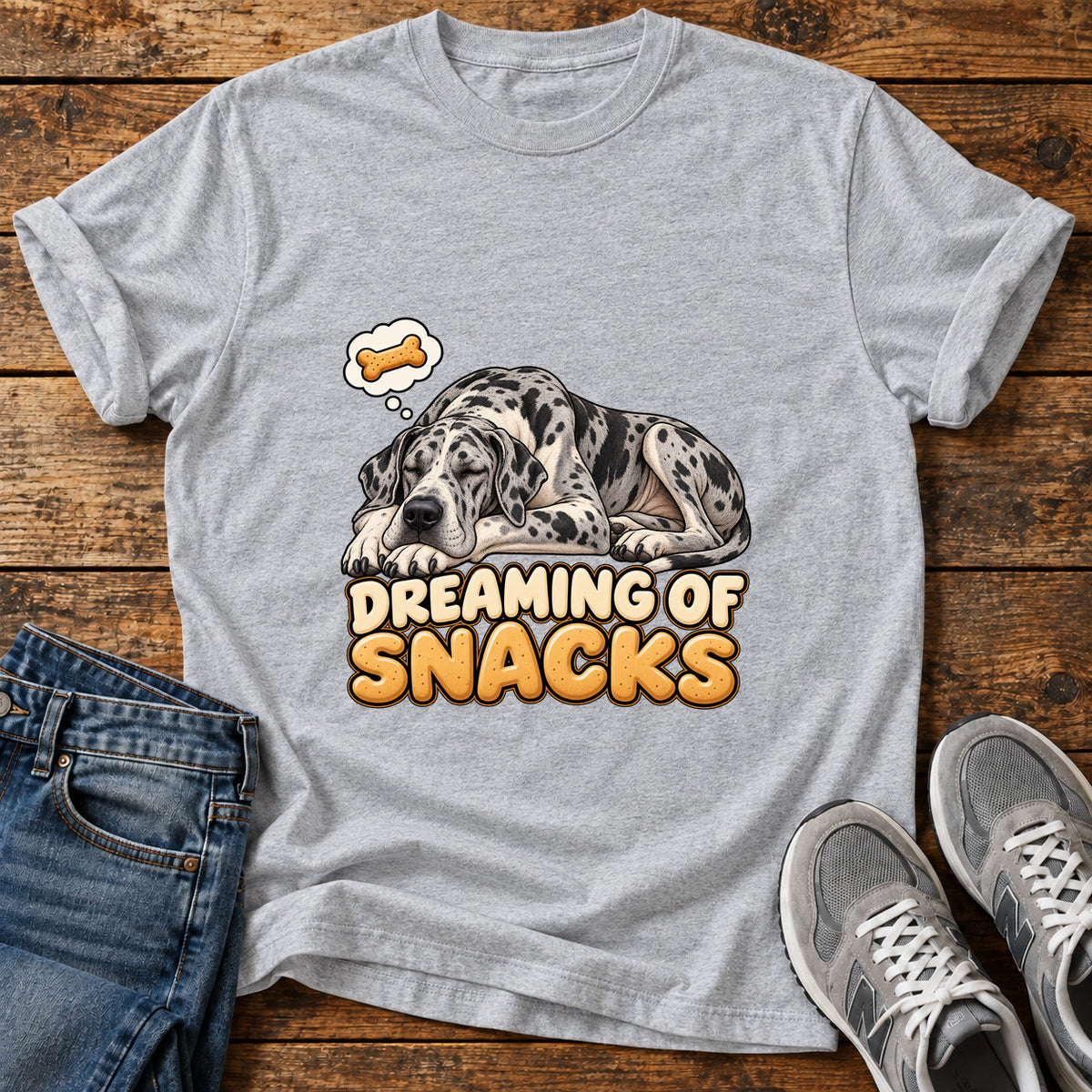 Dreaming Snacks Great Dane graphic T-shirt in Sport Grey, shown on a flat-lay shirt mockup