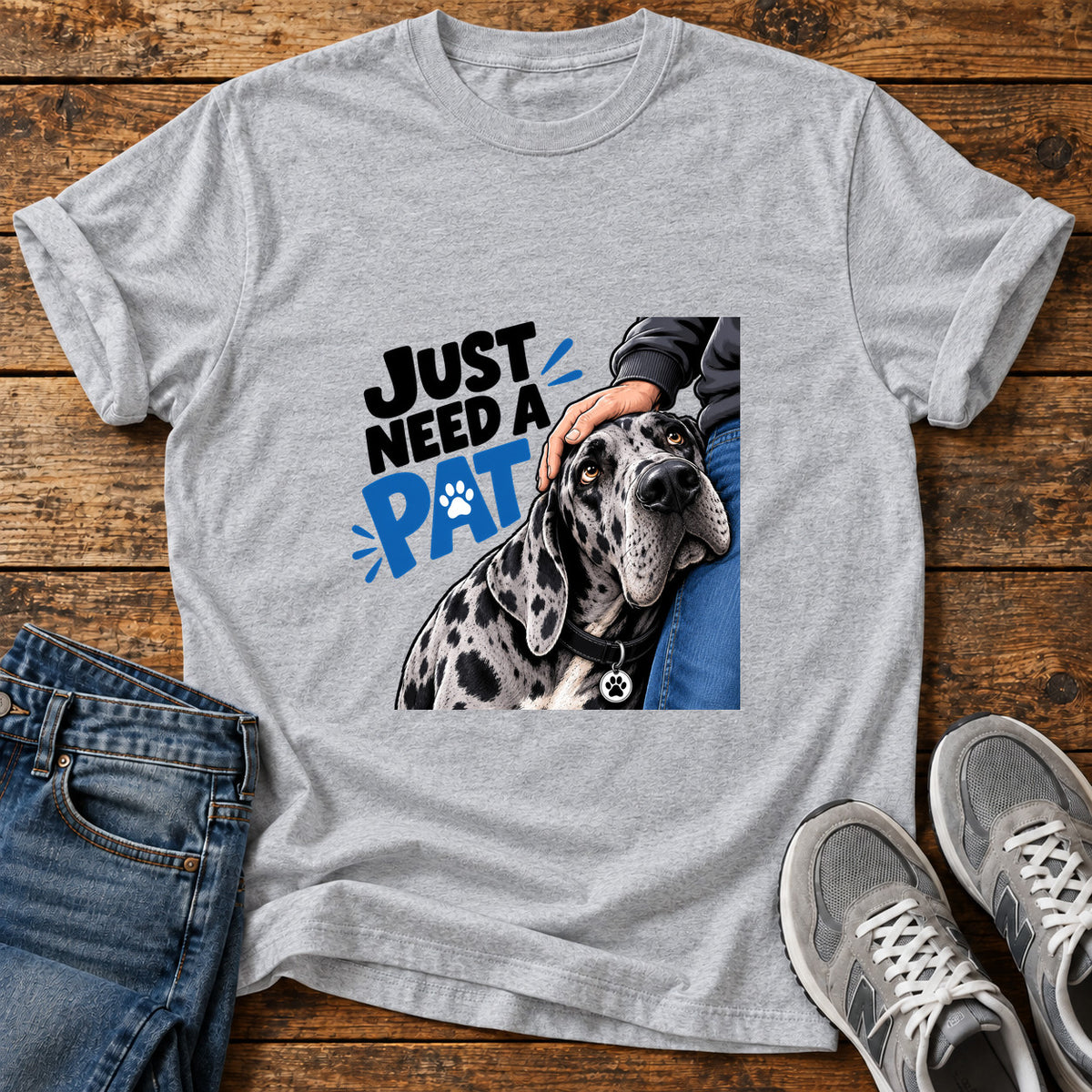 Just Need Pat Great Dane graphic T-shirt in Sport Grey, shown on a flat-lay shirt mockup