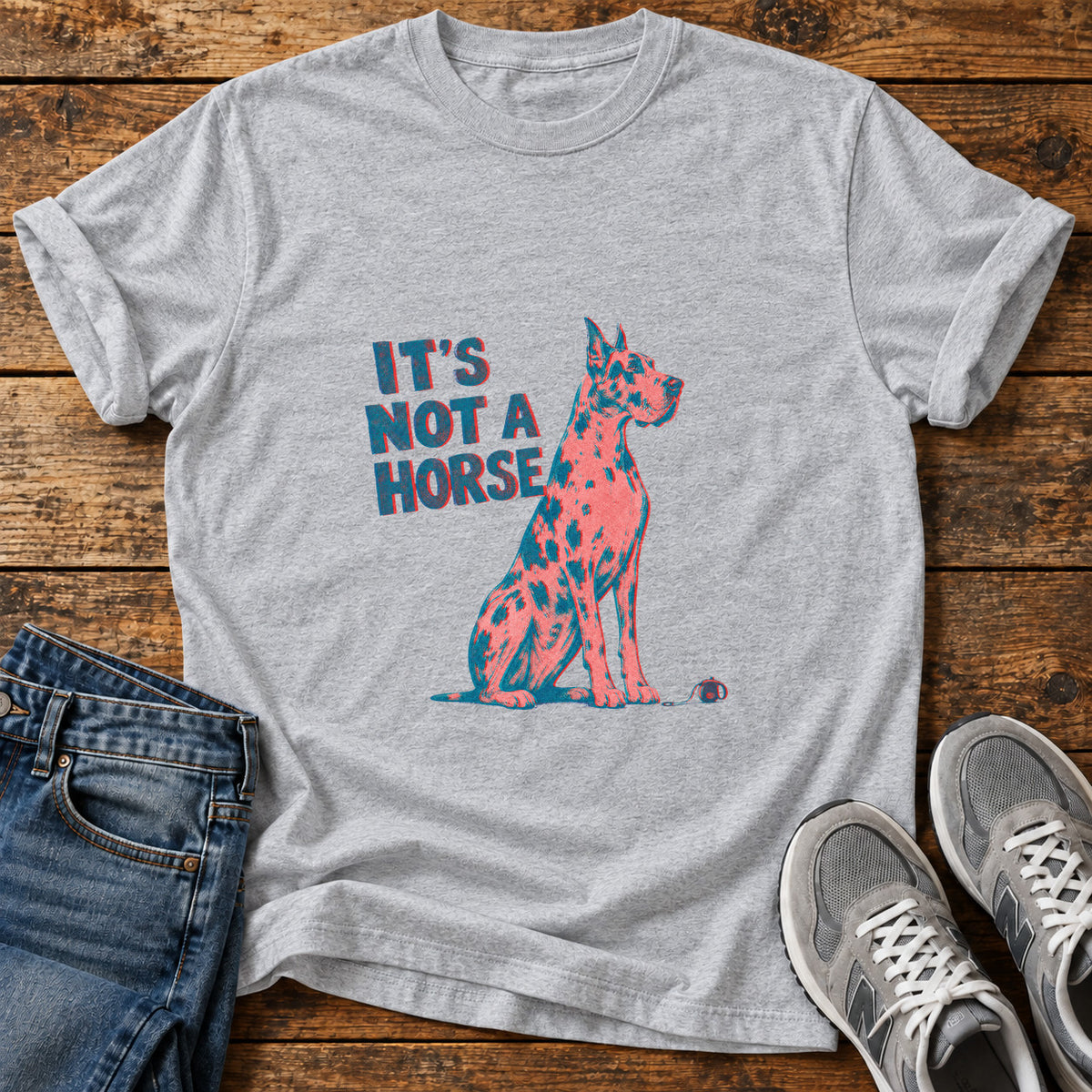It's Not A Great Dane graphic T-shirt in Sport Grey, shown on a flat-lay shirt mockup