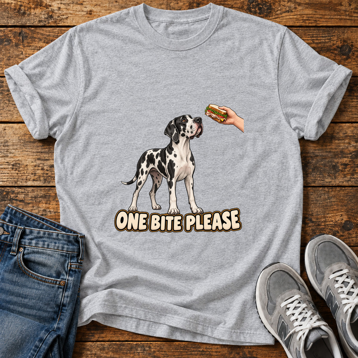 One Bite Please Great Dane graphic T-shirt in Sport Grey, shown on a flat-lay shirt mockup