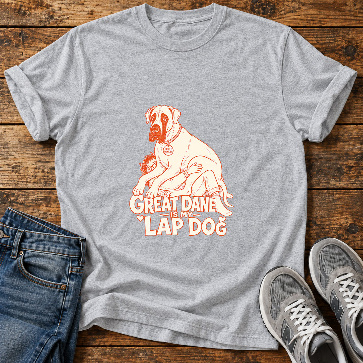 Great Dane Lapdog graphic T-shirt in Sport Grey, shown on a flat-lay shirt mockup