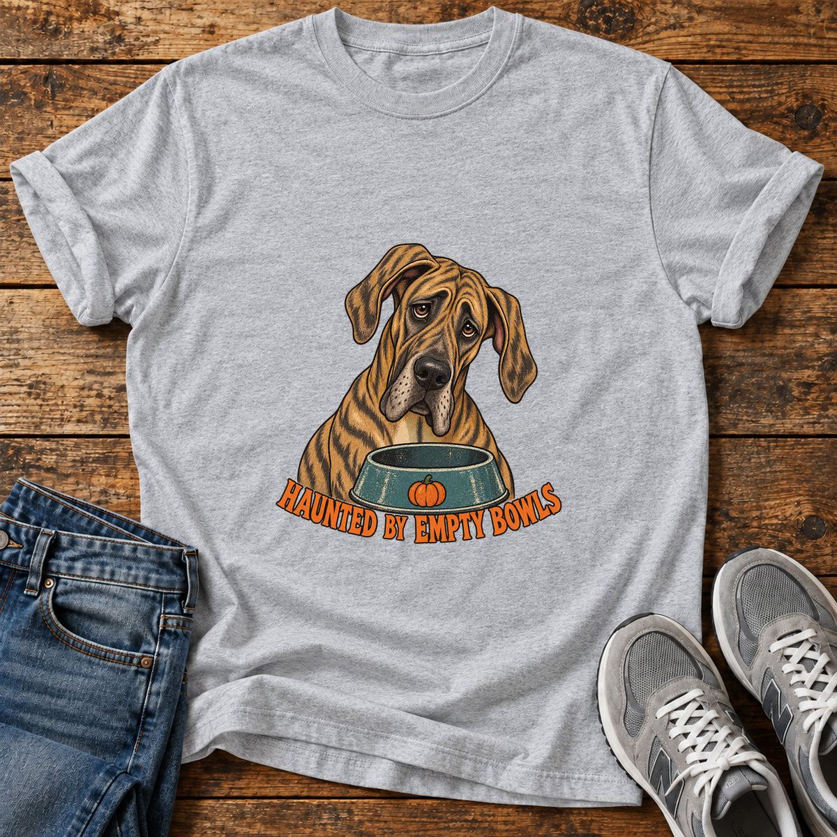 Haunted Bowls Great Dane graphic T-shirt in Sport Grey, shown on a flat-lay shirt mockup