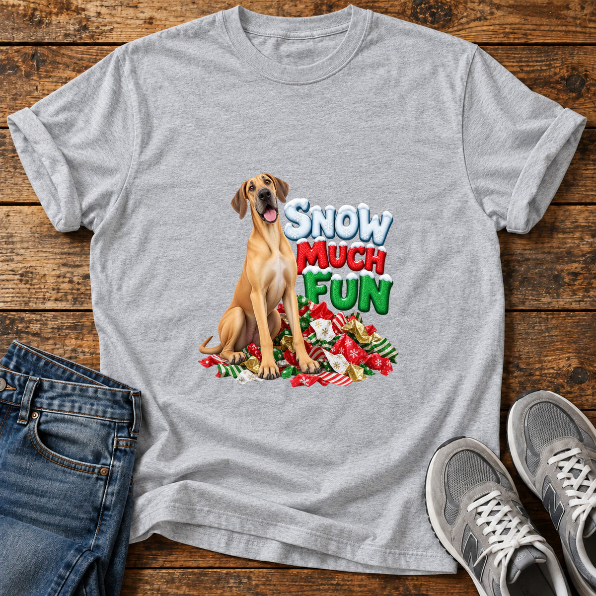Snow Much Fun Great Dane graphic T-shirt in Sport Grey, shown on a flat-lay shirt mockup