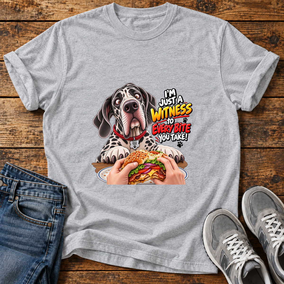 Witness Every Bite Great Dane graphic T-shirt in Sport Grey, shown on a flat-lay shirt mockup
