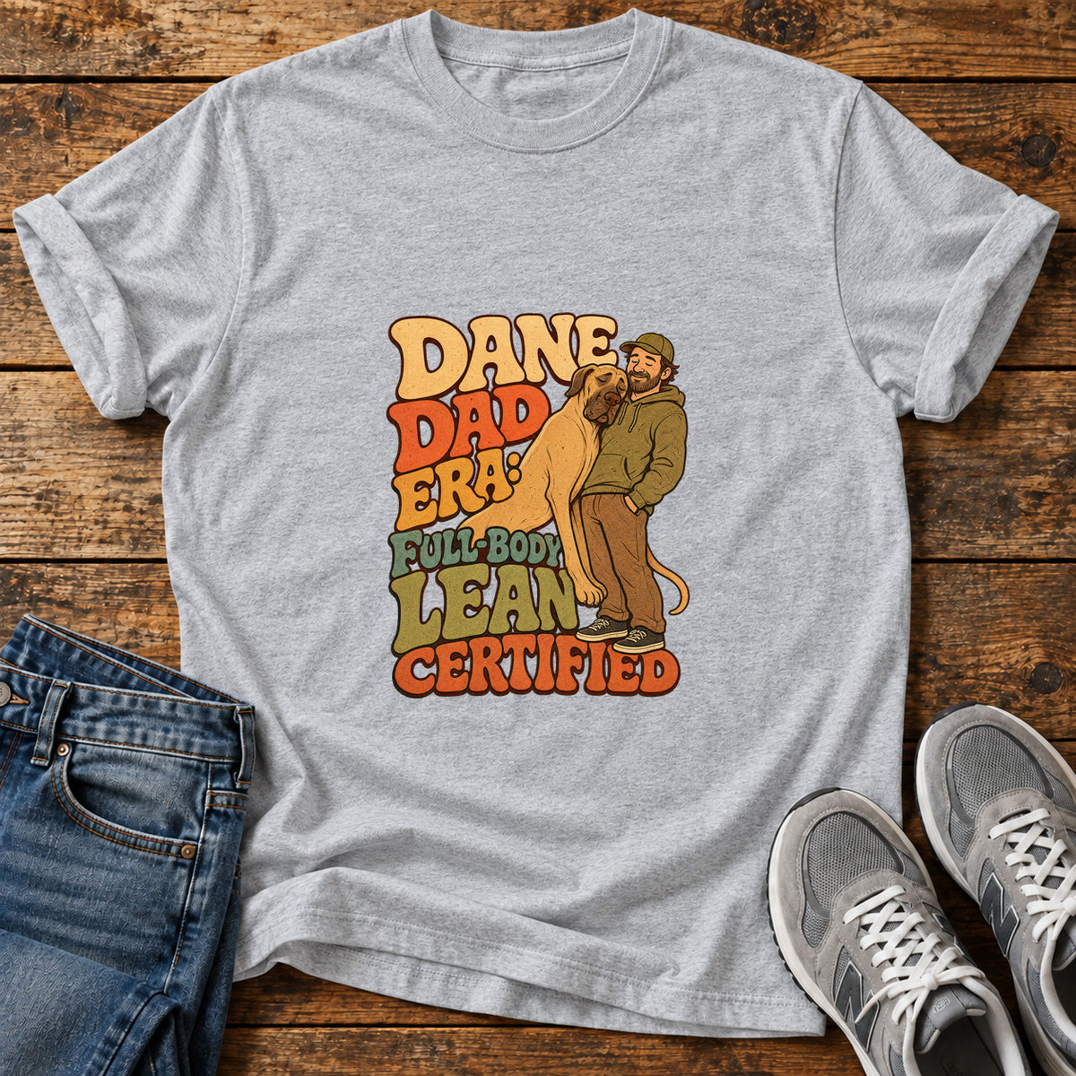 Dane Dad Certified Great Dane graphic T-shirt in Sport Grey, shown on a flat-lay shirt mockup