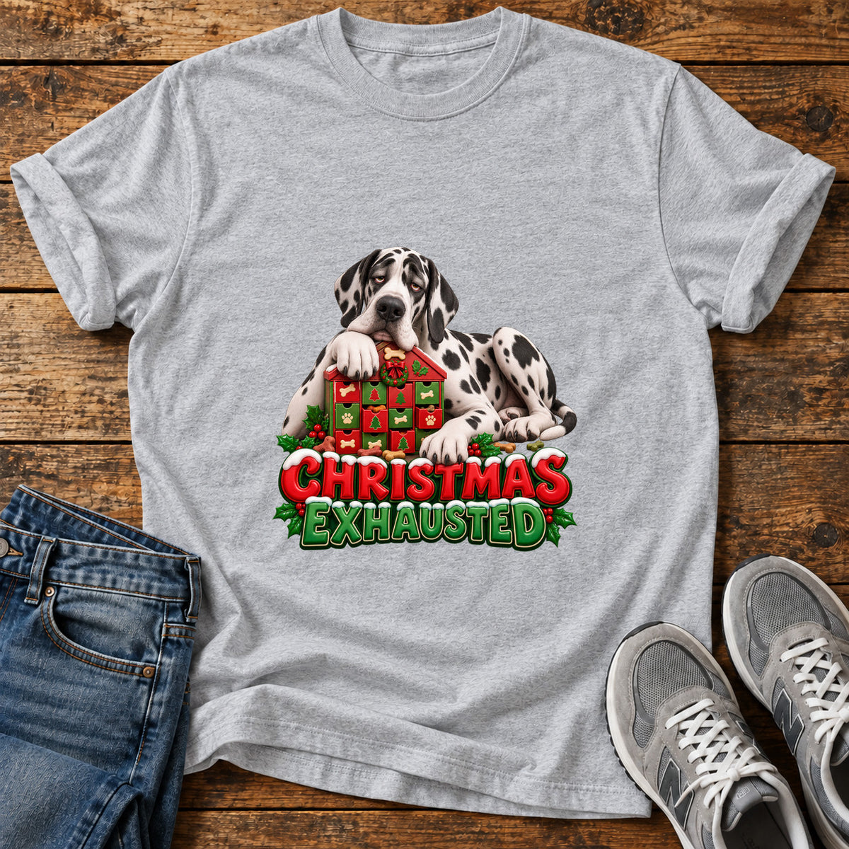 Christmas Exhausted Great Dane graphic T-shirt in Sport Grey, shown on a flat-lay shirt mockup