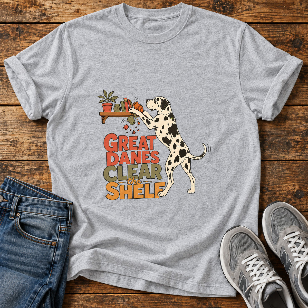 Great Danes Shelf graphic T-shirt in Sport Grey, shown on a flat-lay shirt mockup