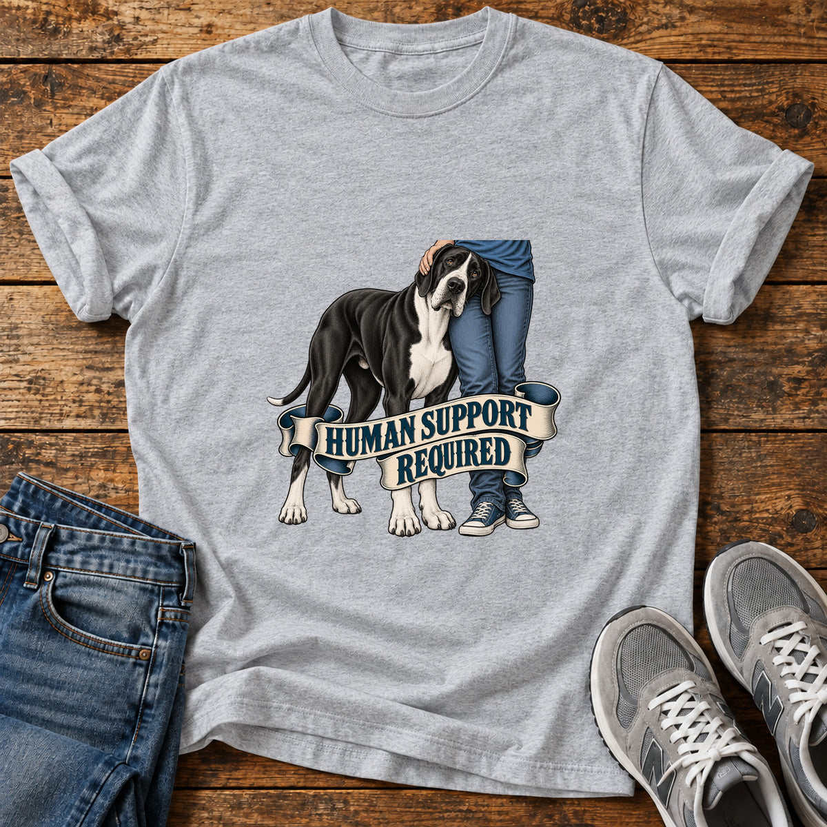 Human Support Required Great Dane graphic T-shirt in Sport Grey, shown on a flat-lay shirt mockup