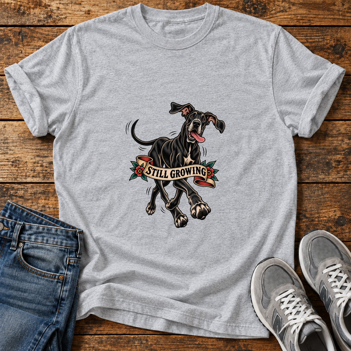 Still Growing Great Dane graphic T-shirt in Sport Grey, shown on a flat-lay shirt mockup