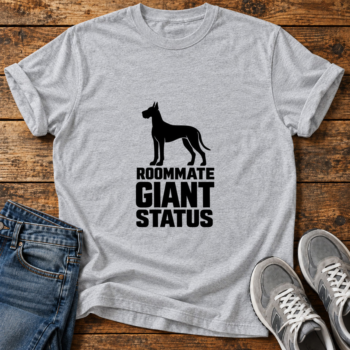 Roommate Giant Status Great Dane graphic T-shirt in Sport Grey, shown on a flat-lay shirt mockup