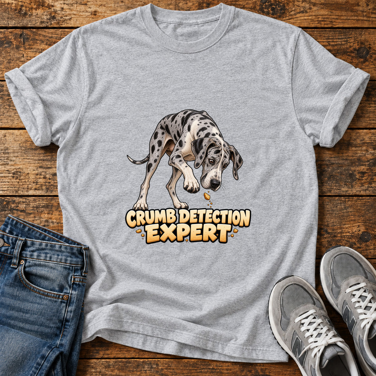 Crumb Detection Expert Great Dane graphic T-shirt in Sport Grey, shown on a flat-lay shirt mockup