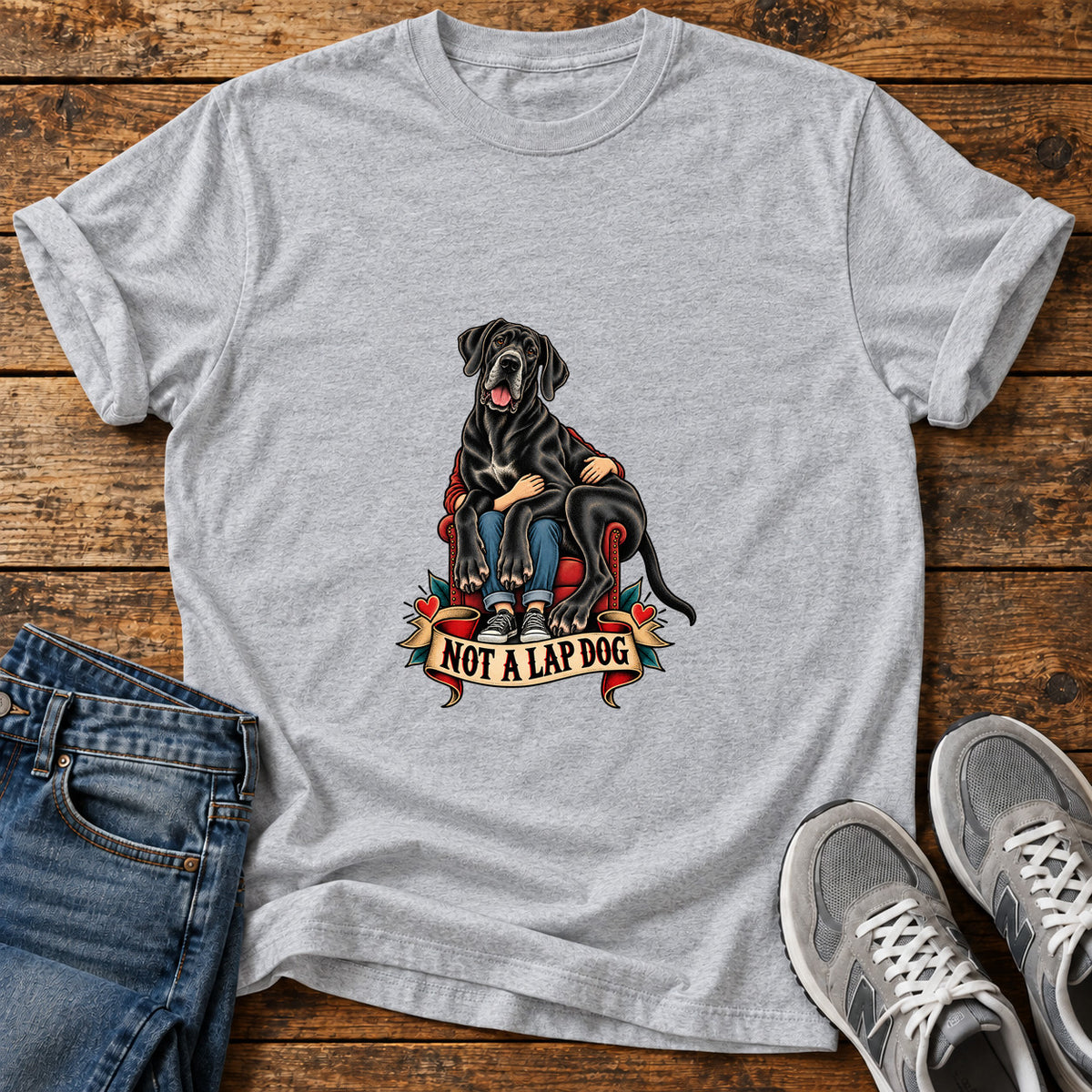 Not A Lapdog Great Dane graphic T-shirt in Sport Grey, shown on a flat-lay shirt mockup