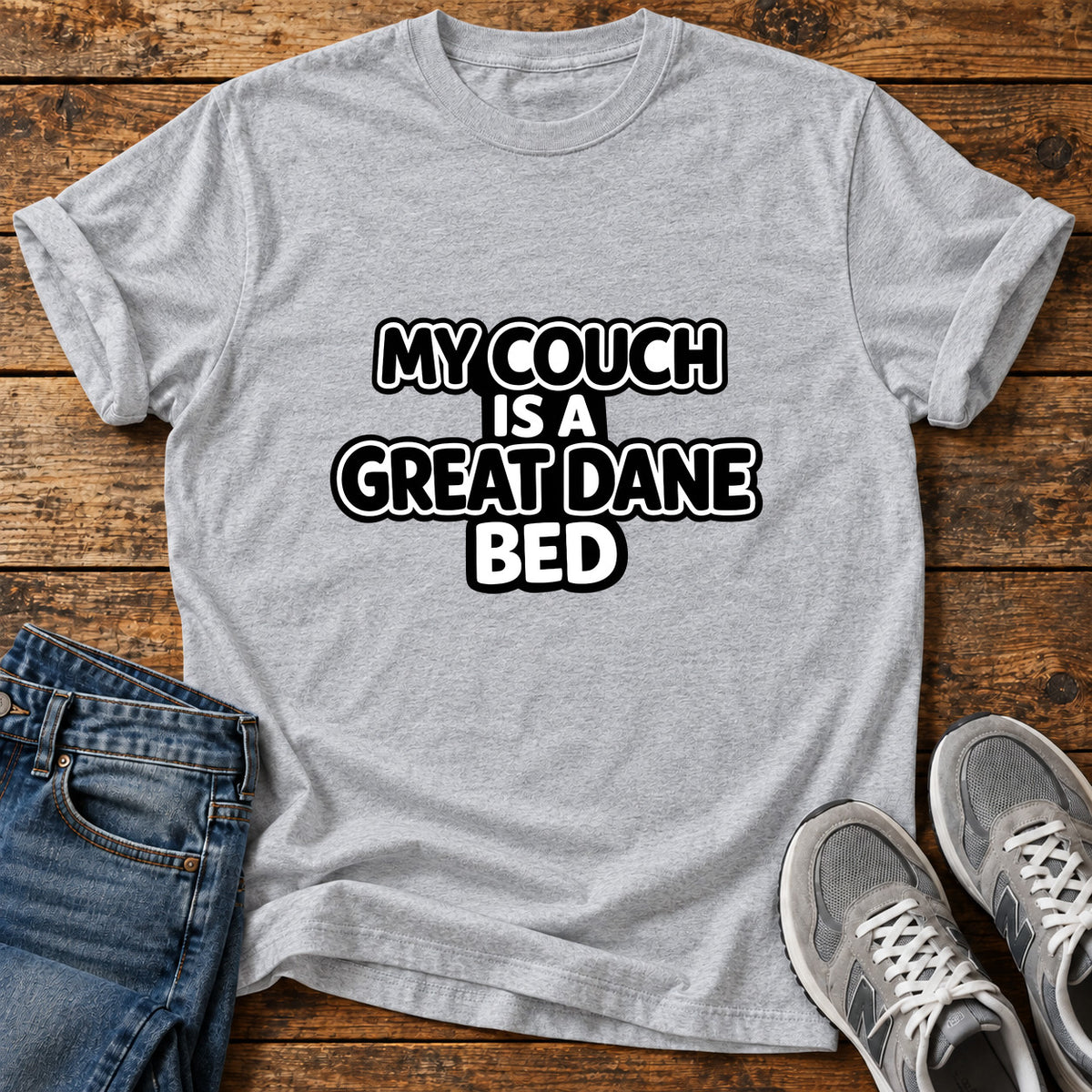 Great Dane Bed graphic T-shirt in Sport Grey, shown on a flat-lay shirt mockup