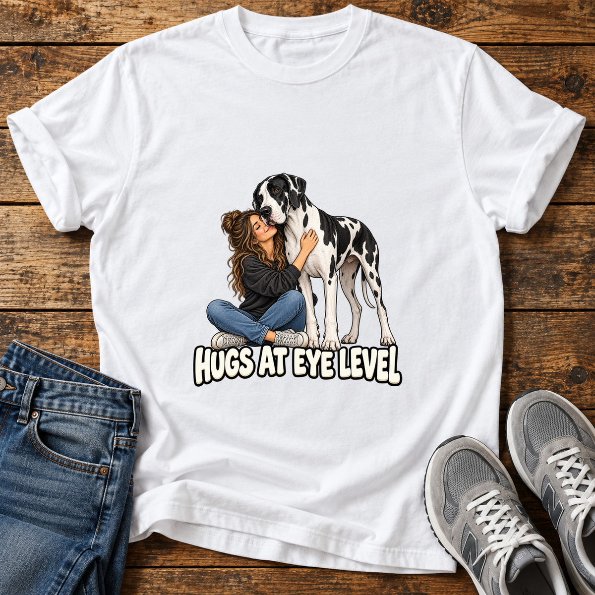 Hugs At Eye Great Dane graphic T-shirt in White, shown on a flat-lay shirt mockup