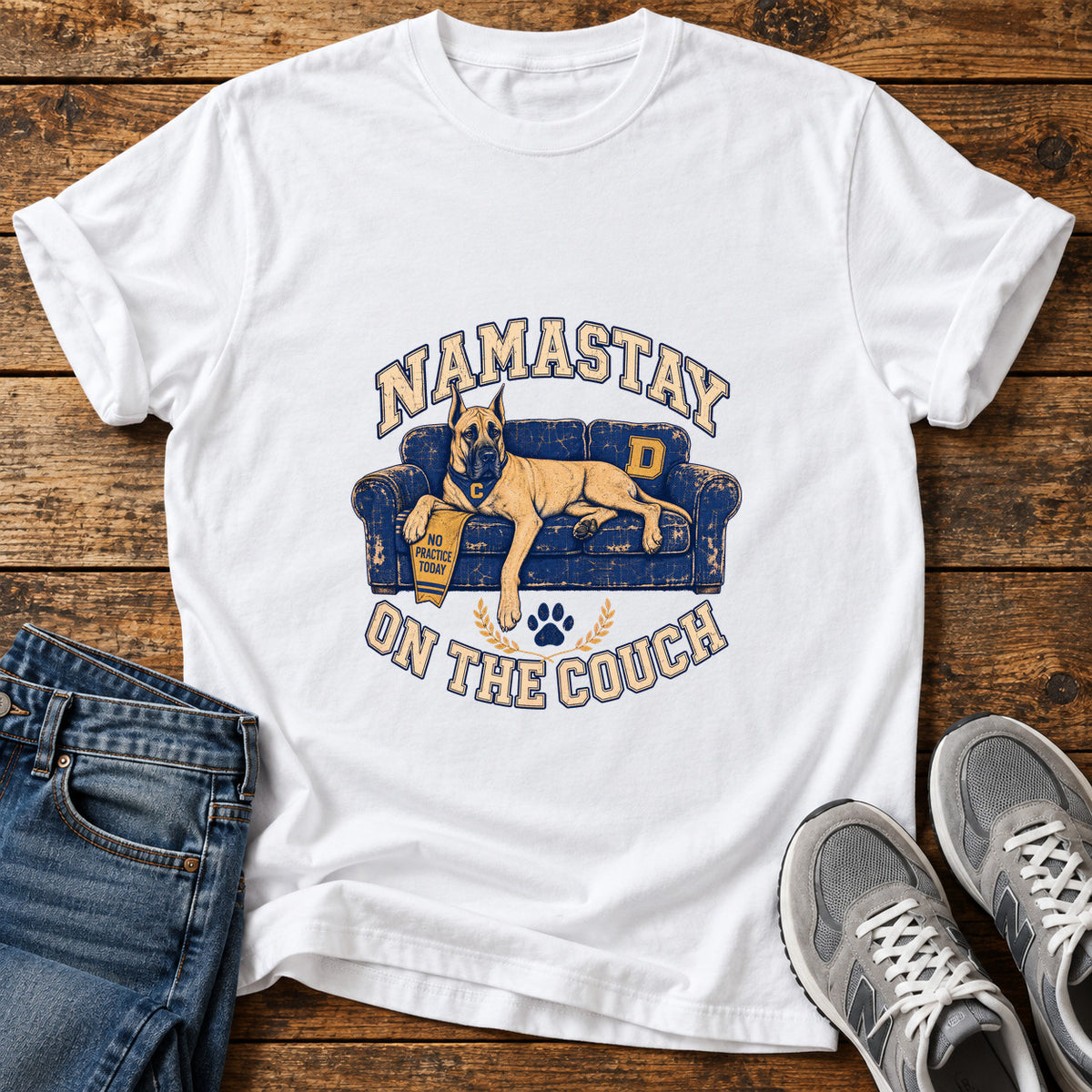 Namastay Couch Great Dane graphic T-shirt in White, shown on a flat-lay shirt mockup