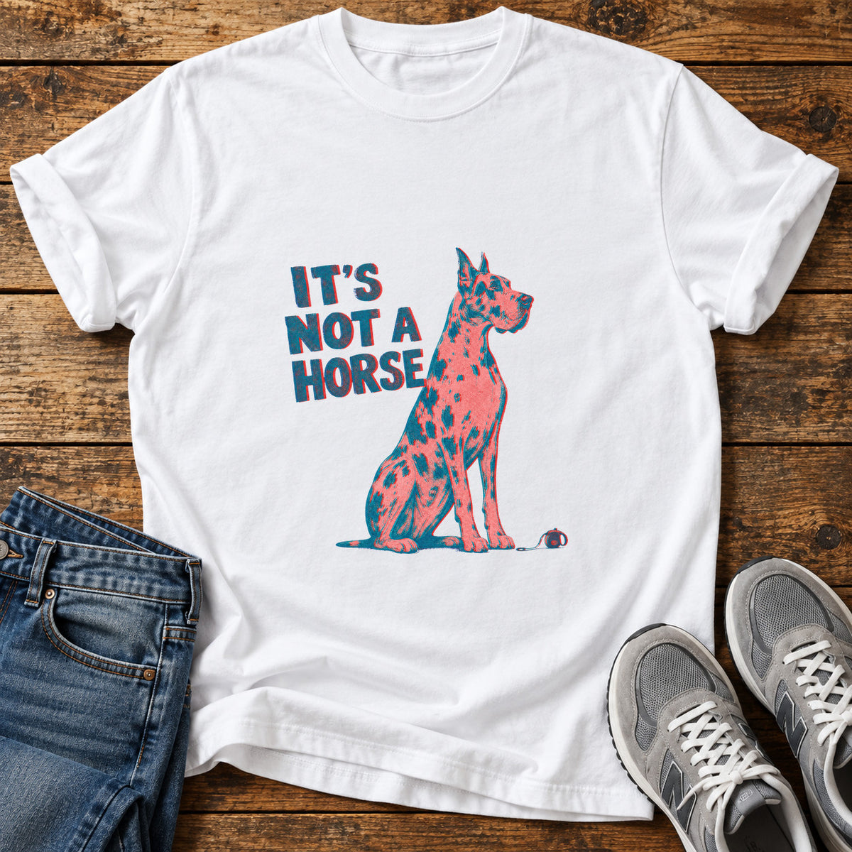 It's Not A Great Dane graphic T-shirt in White, shown on a flat-lay shirt mockup