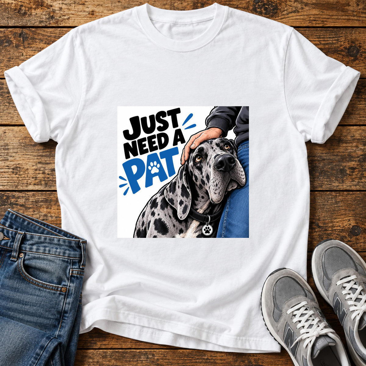 Just Need Pat Great Dane graphic T-shirt in White, shown on a flat-lay shirt mockup