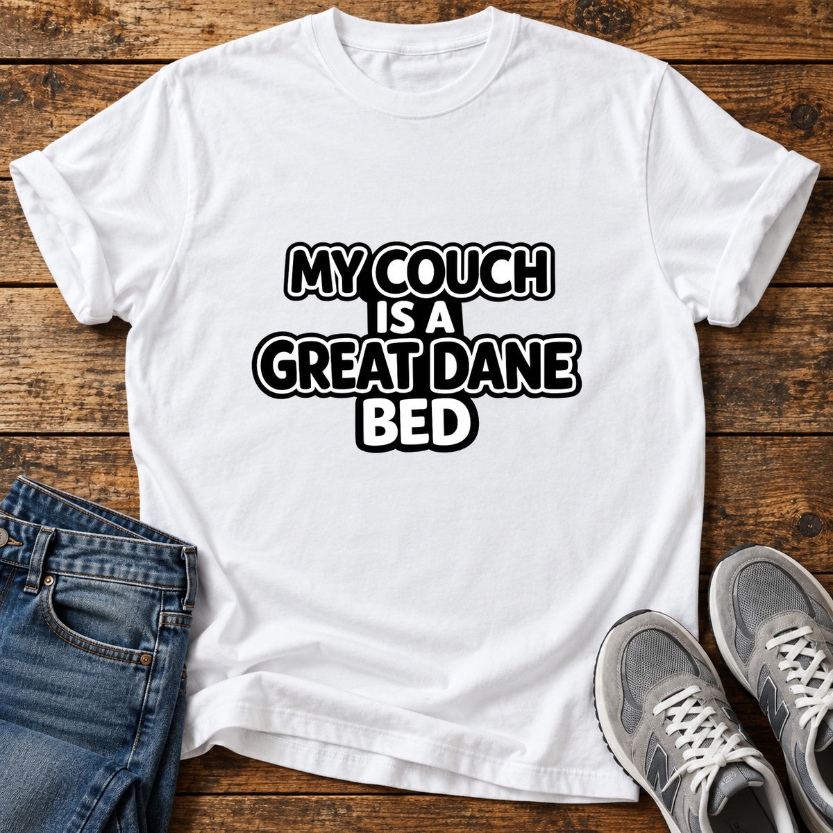 Great Dane Bed graphic T-shirt in White, shown on a flat-lay shirt mockup