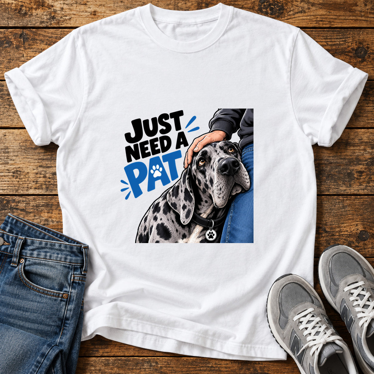 Just Need Pat Great Dane graphic T-shirt in White, shown on a flat-lay shirt mockup